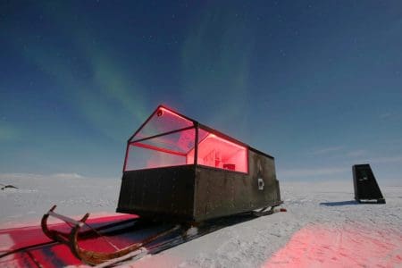 Take a Snowmobile to Your Hotel on Skis