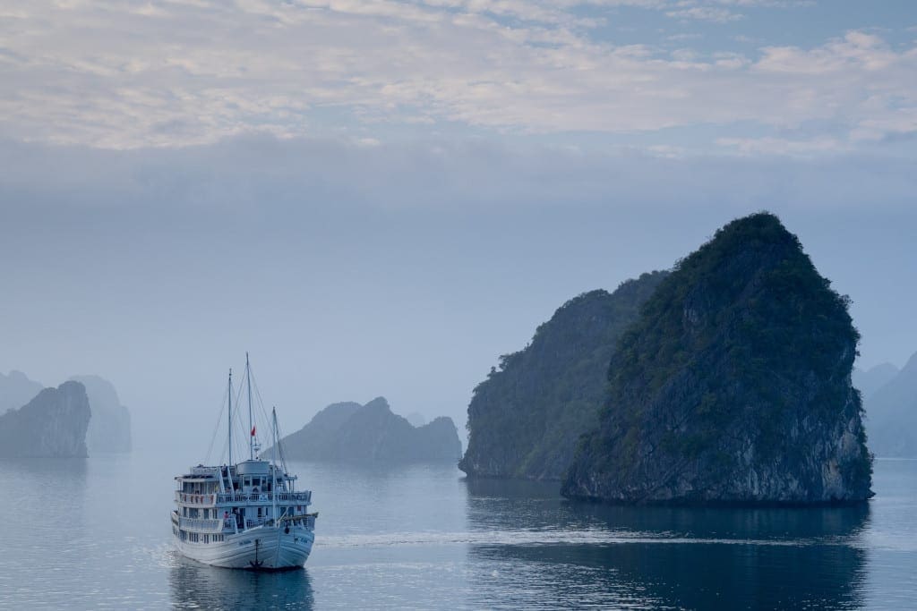 Halong Bay cruise through the mist, c. Andre Ouellet