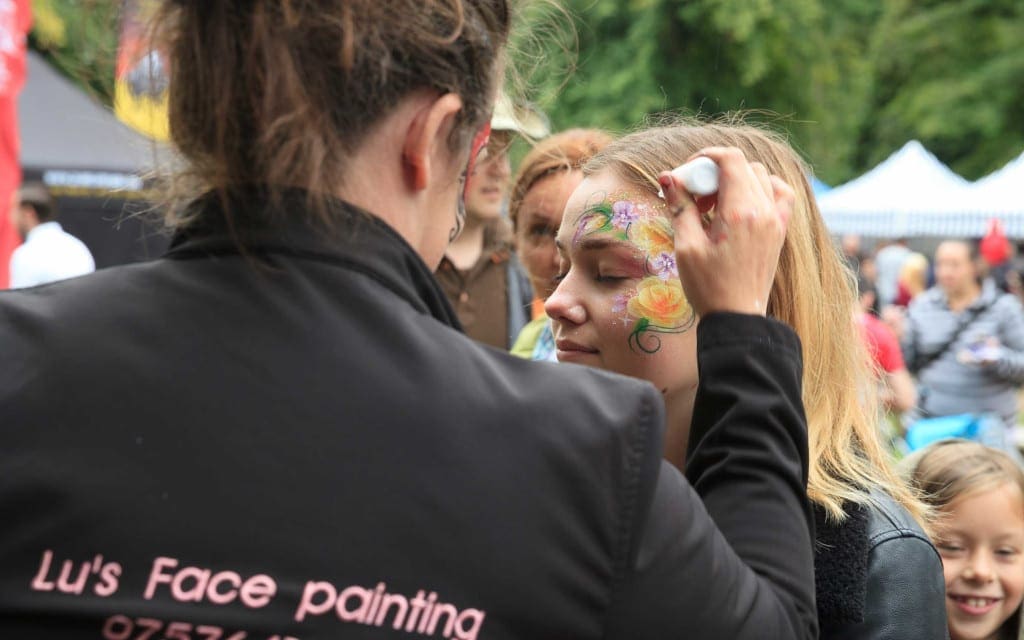 Chilli Fest face painting. Image, Adam Hollier (c) National Trust, Waddesdon Manor