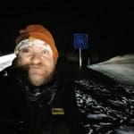 Mark at the Finnish border during Northern Lights experience.