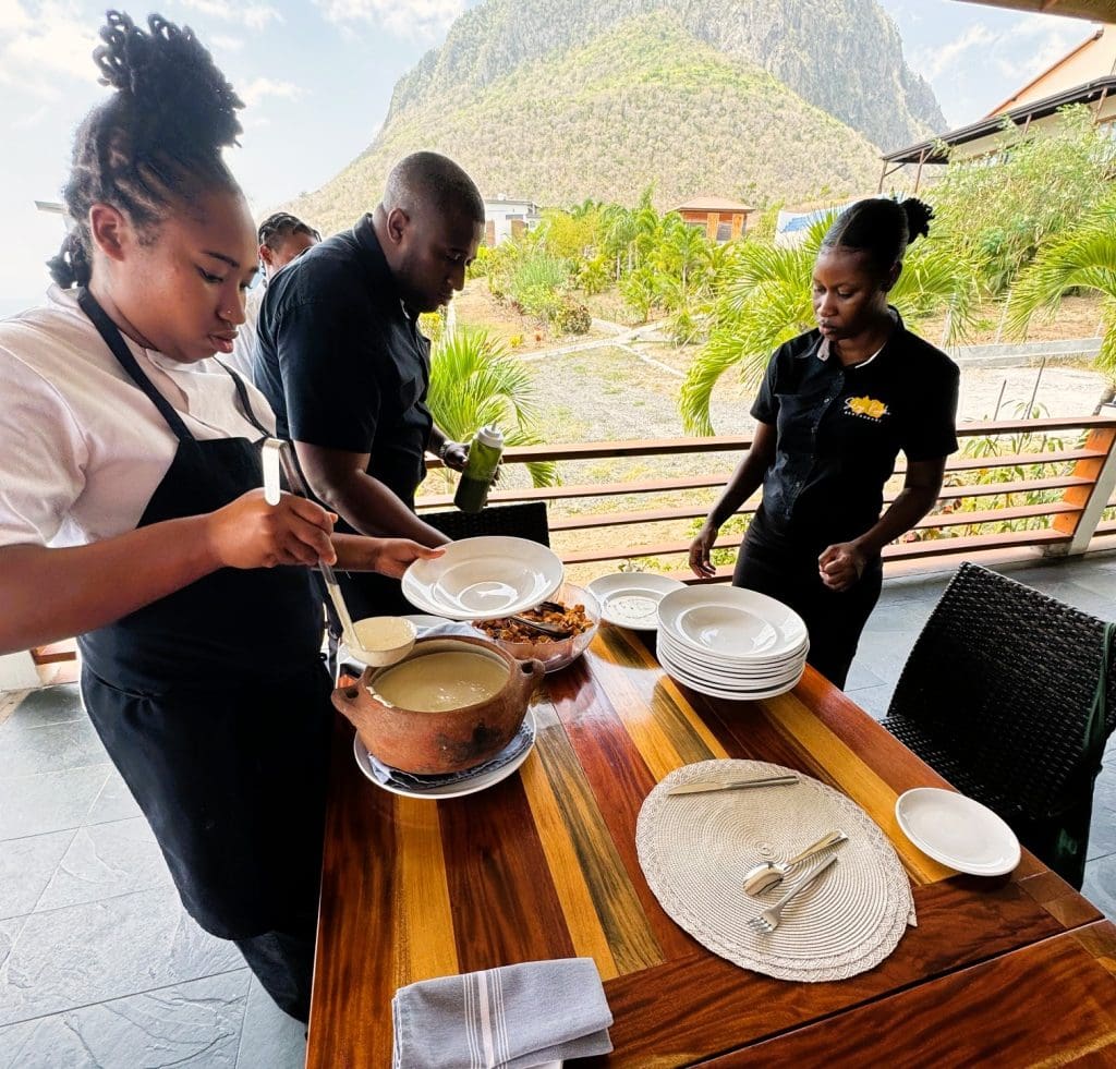 Kyrah Henry preparing the food at Soley Kuche