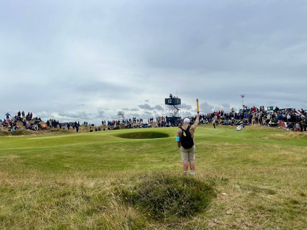 Hushing the crowd at The Open Tournament