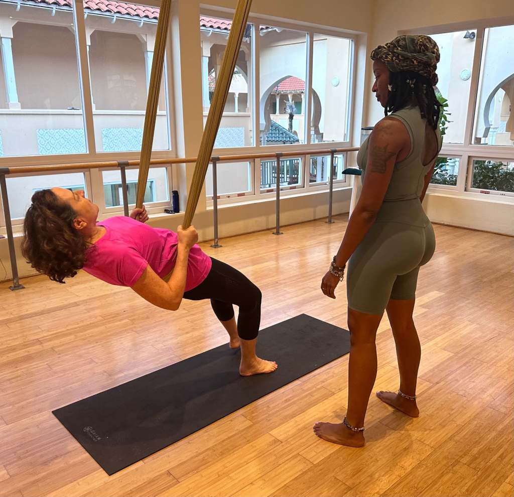 Maria experiences aerial yoga at BodyHotel